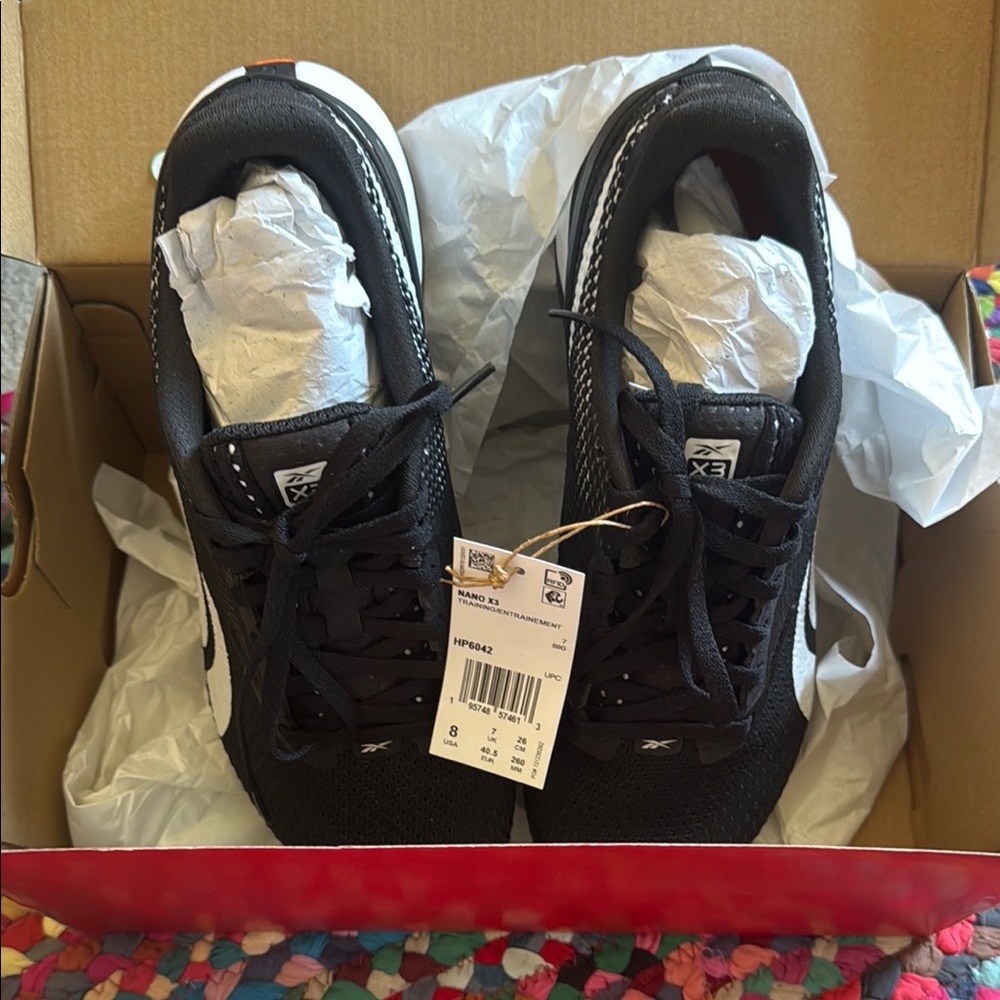 Reebok Black Sneakers with Slip-On Style and Rubber Sole
